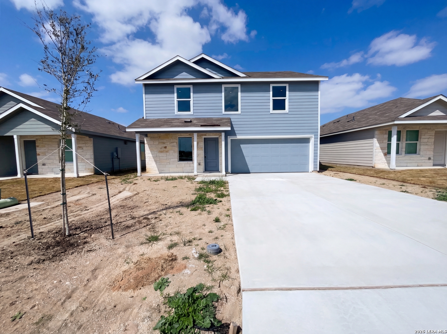 320 Pacific Waters Seguin, TX 78155 - Photo 1 of 16 a front view of a house with garage