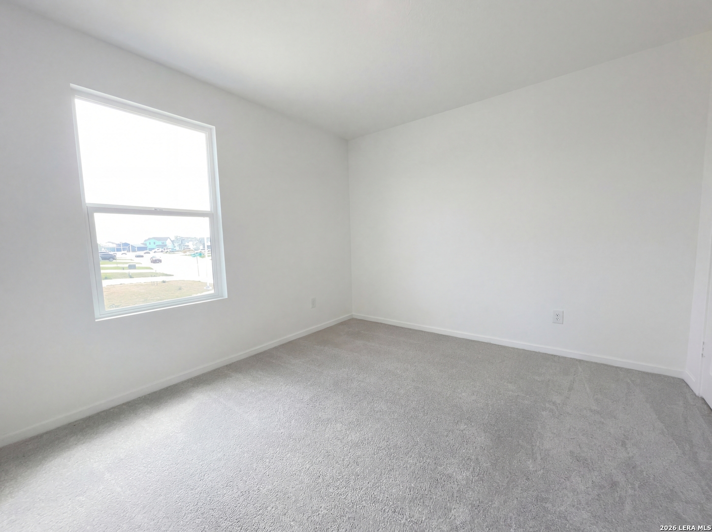 320 Pacific Waters Seguin, TX 78155 - Photo 13 of 16 an empty room with a window