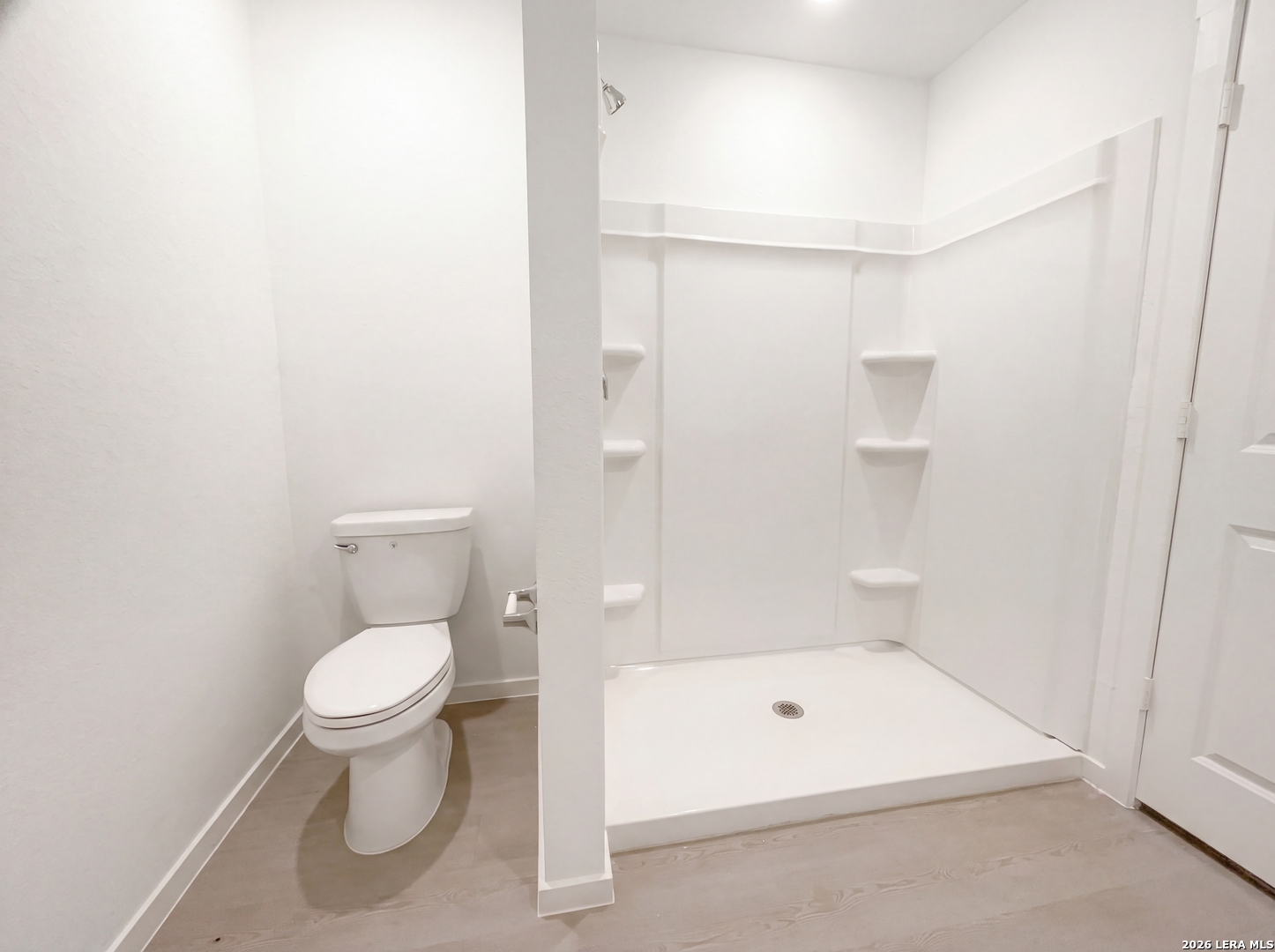 320 Pacific Waters Seguin, TX 78155 - Photo 9 of 16 a bathroom with a toilet a sink and shower
