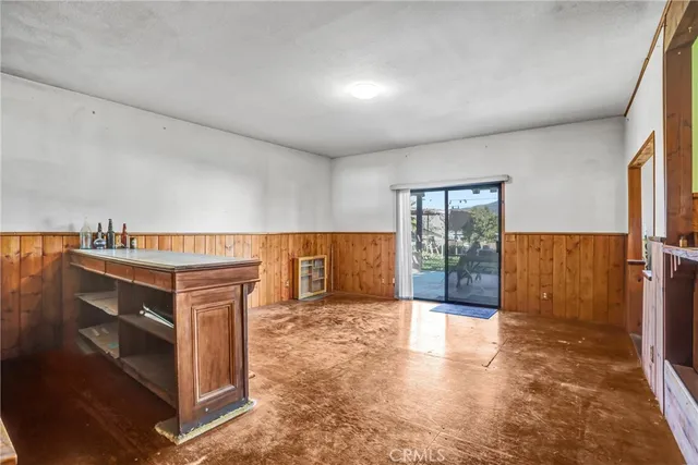 a view of a large window with kitchen view