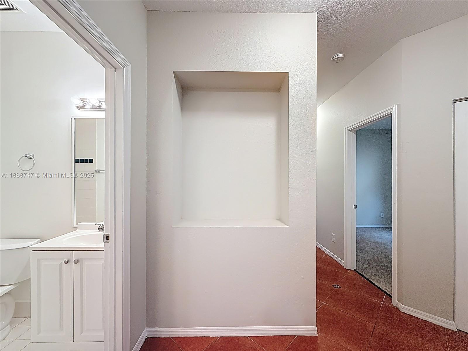 5317 Southwest 133rd Avenue Miramar, FL 33027 - Photo 27 of 38 wooden floor in a bathroom