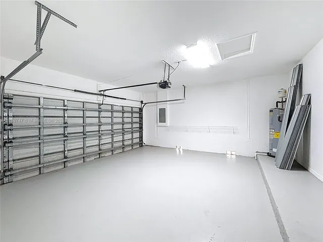 a view of a garage with stairs