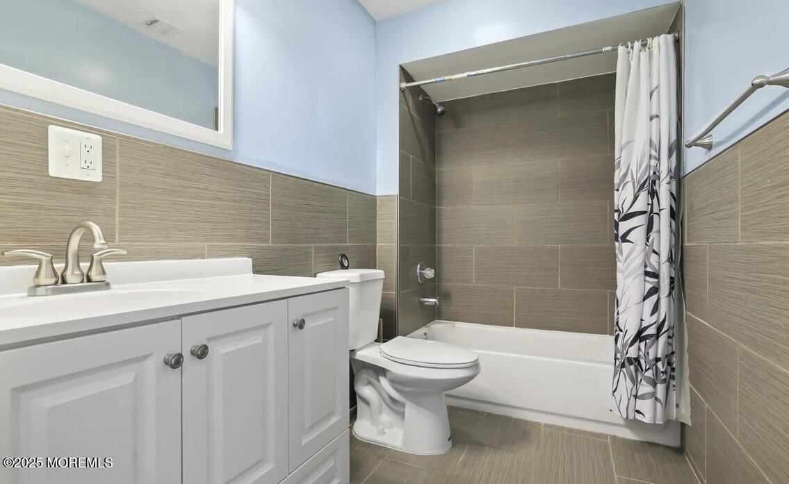 2207 Main Street Lake Como, NJ 07719 - Photo 17 of 22 a bathroom with a sink toilet and shower