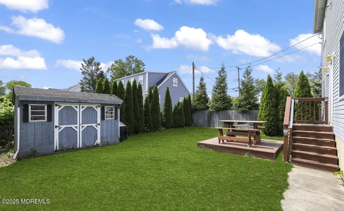 2207 Main Street Lake Como, NJ 07719 - Photo 22 of 22 a view of a house with backyard and porch