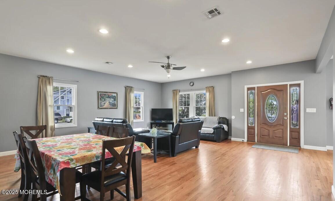2207 Main Street Lake Como, NJ 07719 - Photo 6 of 22 a view of a dining room with furniture window and wooden floor