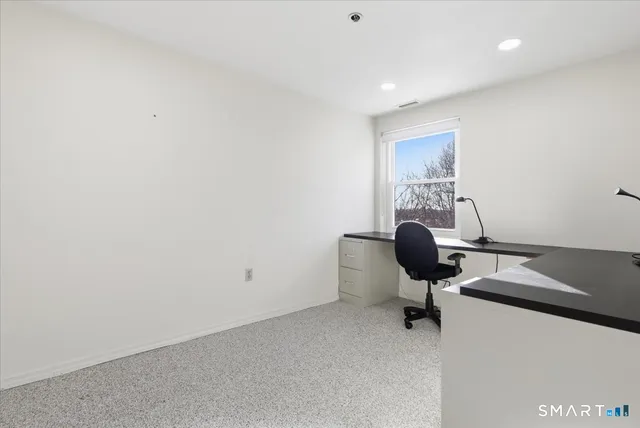 a view of workspace with a window