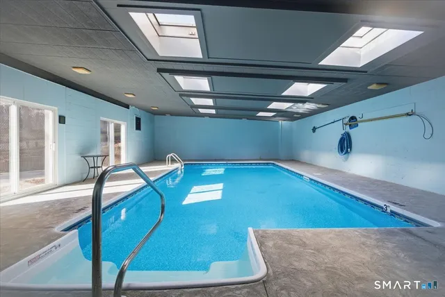 a view of a hallway with a couch