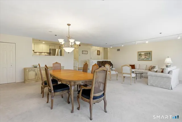a view of a dining room with furniture