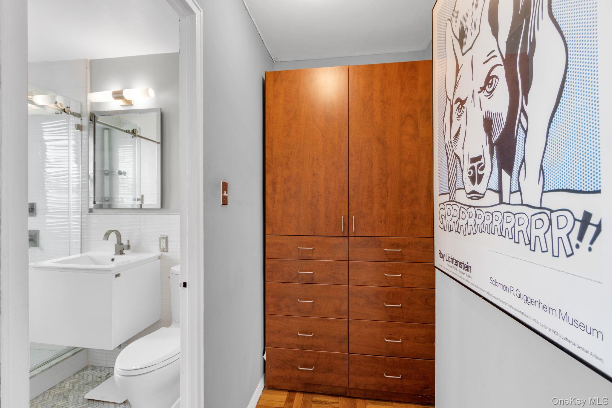 2500 Johnson Avenue, Unit 15P Bronx, NY 10463 - Photo 21 of 50 a bathroom with a sink a toilet and shower