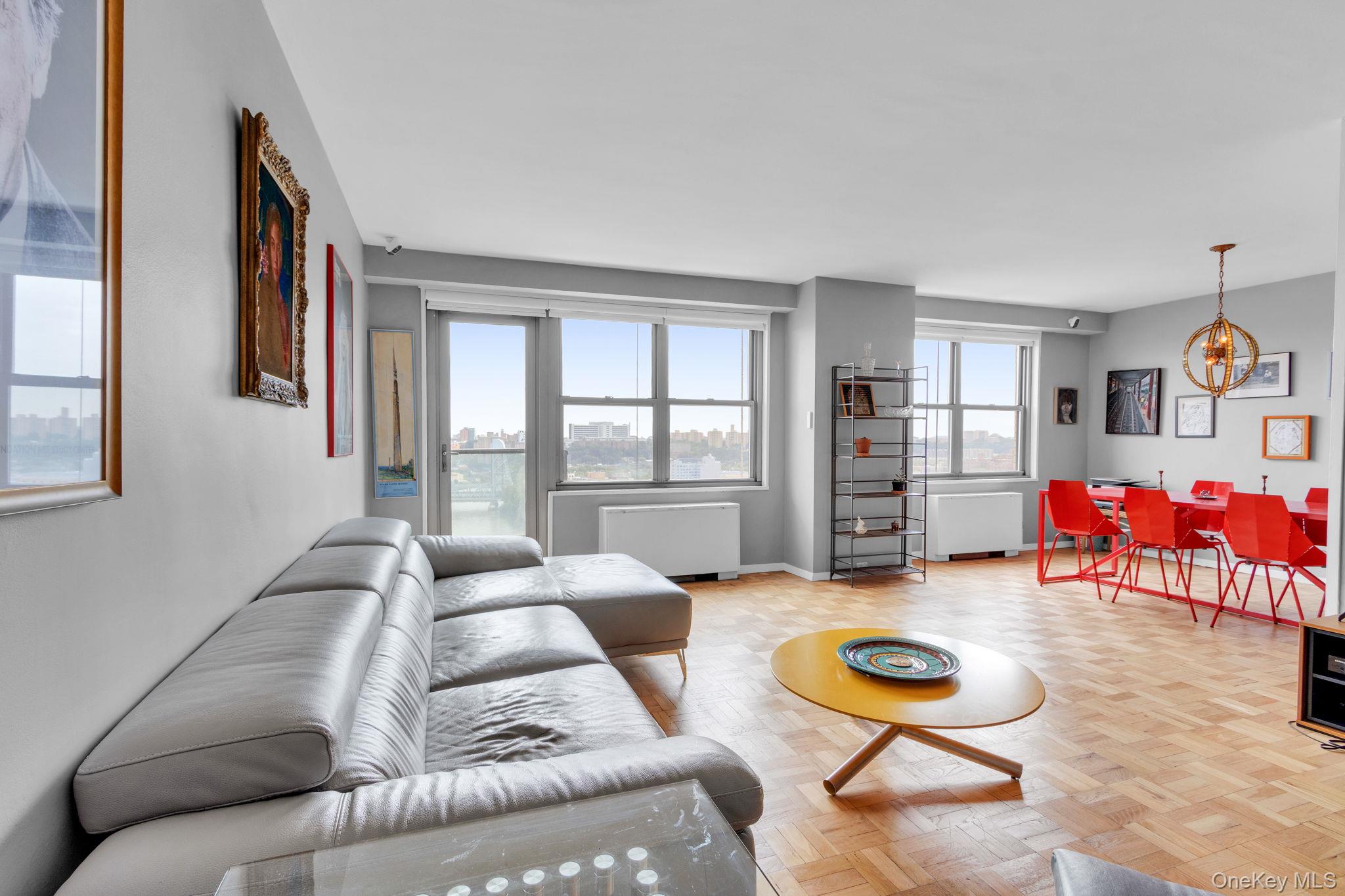 2500 Johnson Avenue, Unit 15P Bronx, NY 10463 - Photo 4 of 50 a living room with furniture and a flat screen tv