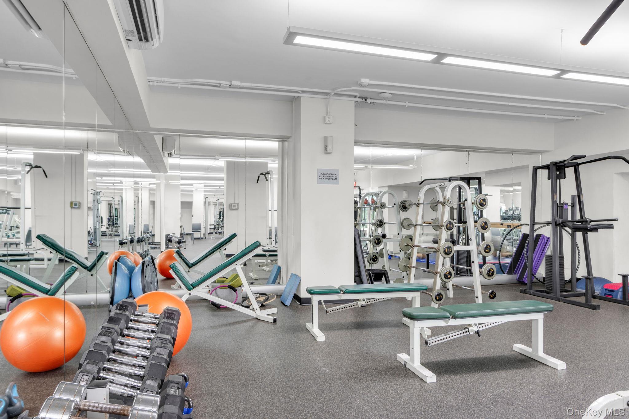 2500 Johnson Avenue, Unit 15P Bronx, NY 10463 - Photo 45 of 50 a view of a room with gym equipment