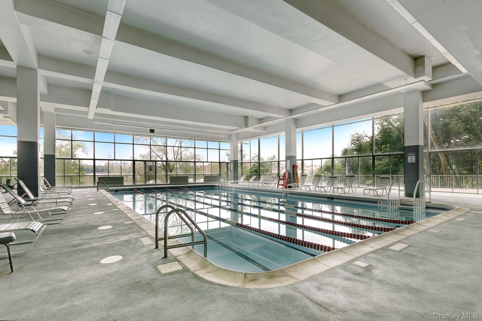 2500 Johnson Avenue, Unit 15P Bronx, NY 10463 - Photo 47 of 50 a view of a swimming pool with outdoor seating