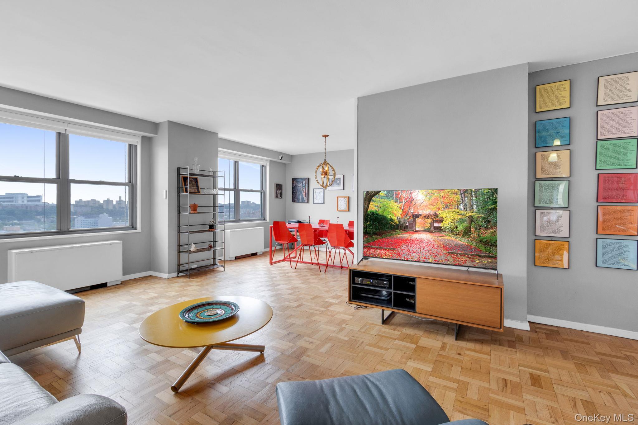 2500 Johnson Avenue, Unit 15P Bronx, NY 10463 - Photo 5 of 50 a living room with furniture and a flat screen tv