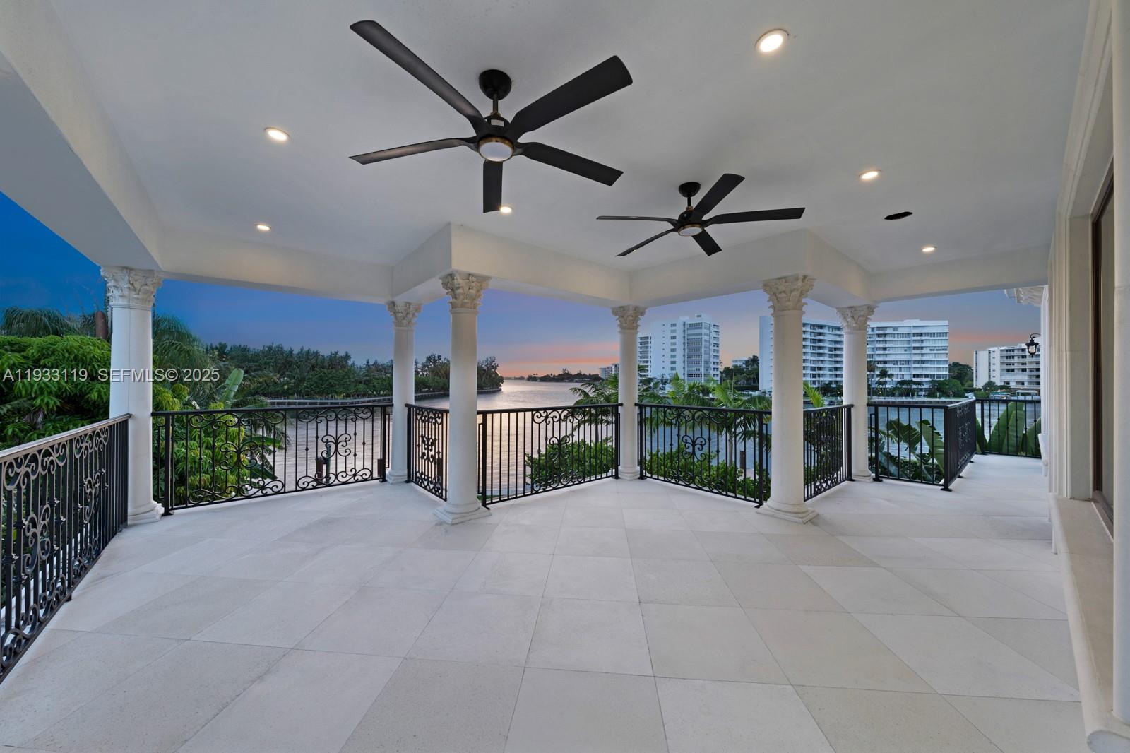 919 92nd Street Surfside, FL 33154 - Photo 28 of 40 a view of a hall with floor to ceiling window and a floor to ceiling window