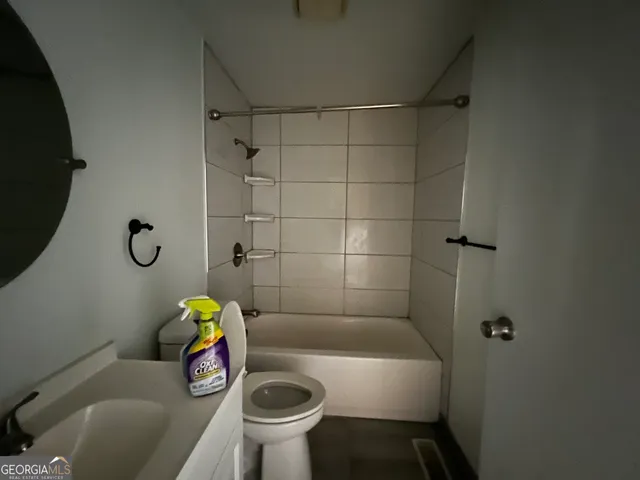 a bathroom with a sink and a bathtub