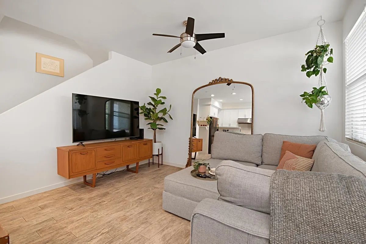 2036 Foxtrot Loop, Unit 4 Chula Vista, CA 91915 - Photo 16 of 33 a living room with furniture and a flat screen tv