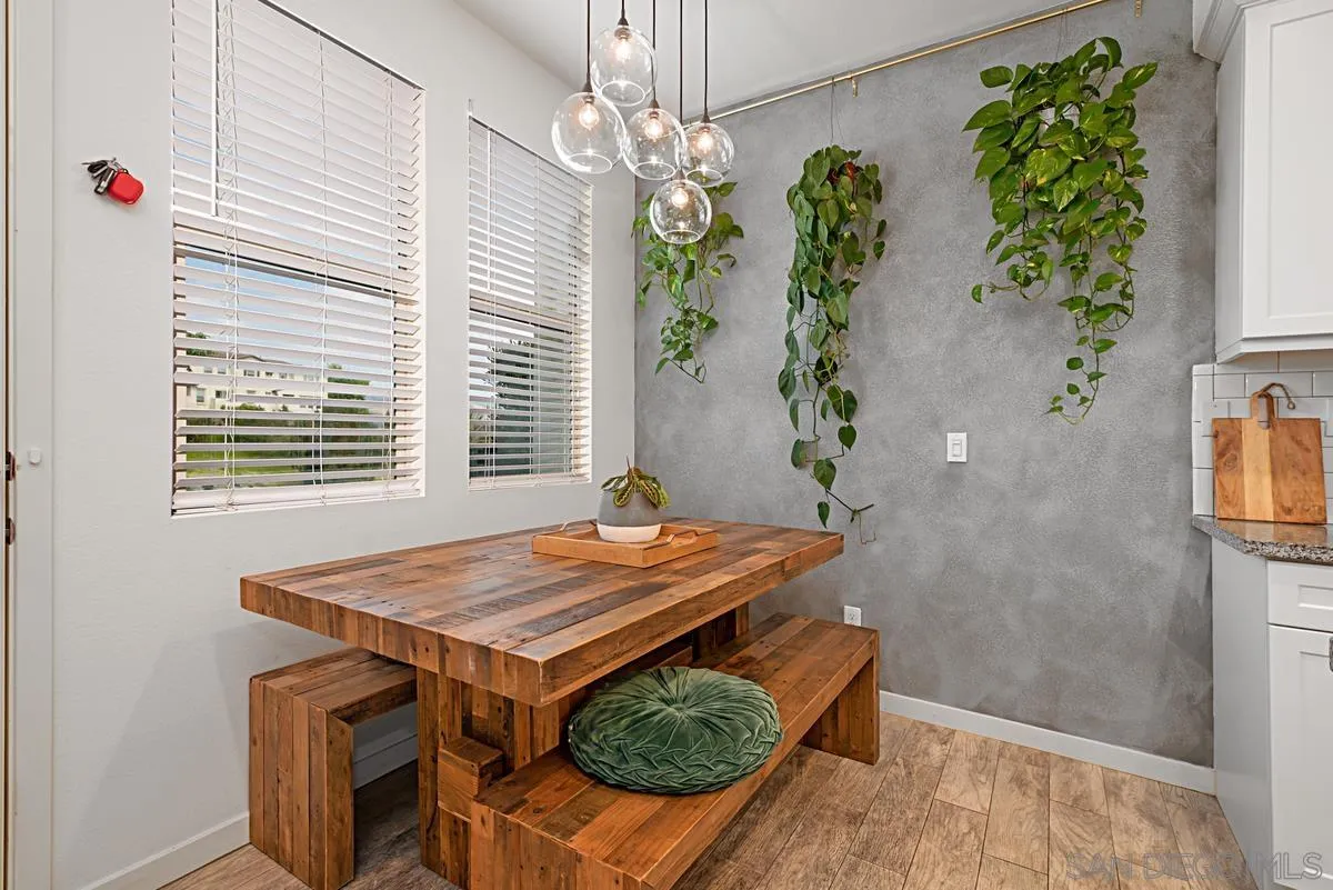 2036 Foxtrot Loop, Unit 4 Chula Vista, CA 91915 - Photo 17 of 33 a dining room with furniture and window