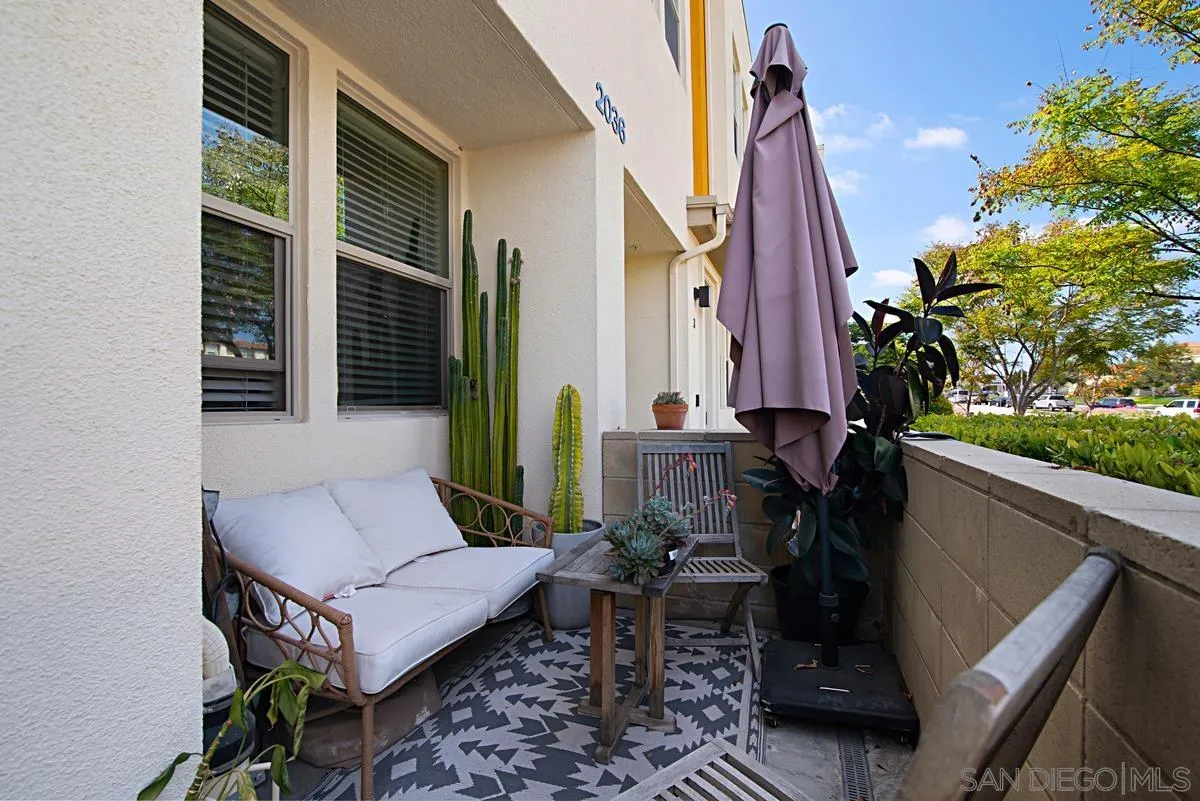 2036 Foxtrot Loop, Unit 4 Chula Vista, CA 91915 - Photo 23 of 33 a backyard of a house with outdoor seating