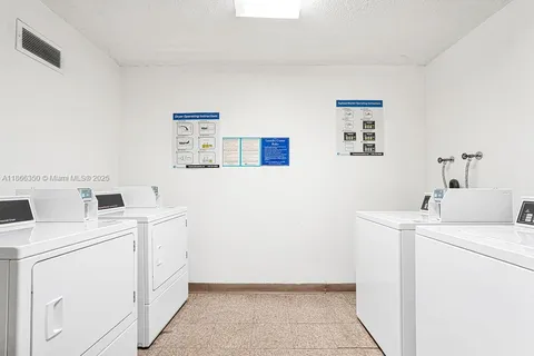 a terrace with a table and chairs