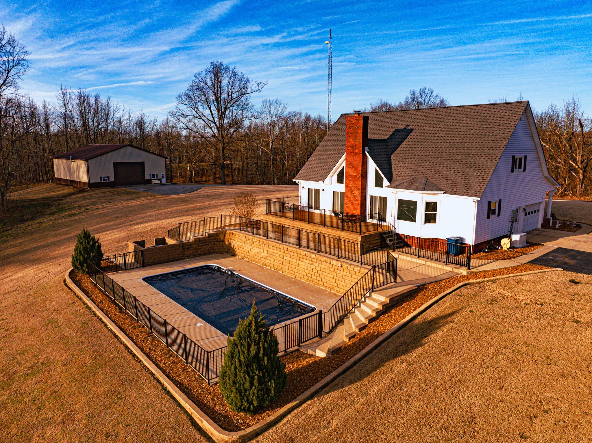 5030 Rogers Marshall Road Union City, TN 38261 - Photo 7 of 40 a view of a house with pool and chairs