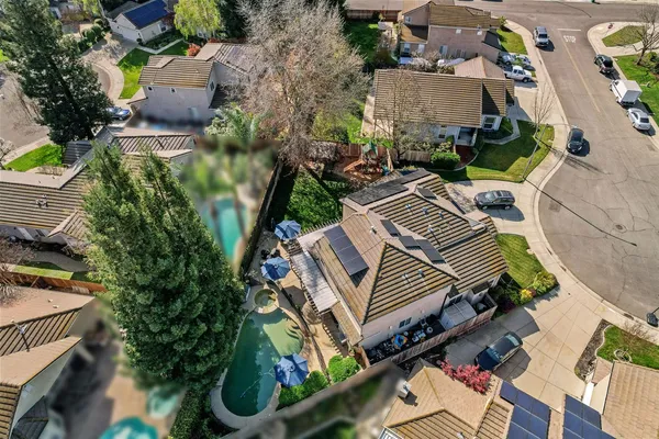 an aerial view of a house with a outdoor space