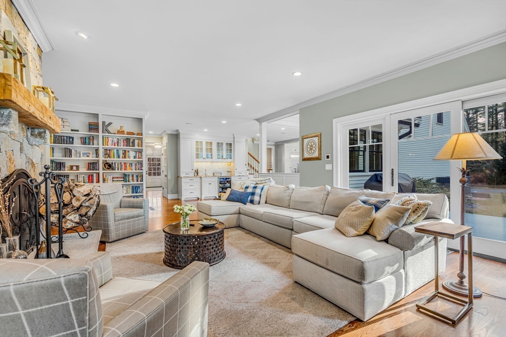 134 Pope Road Acton, MA 01720 - Photo 13 of 39 a living room with furniture and a table