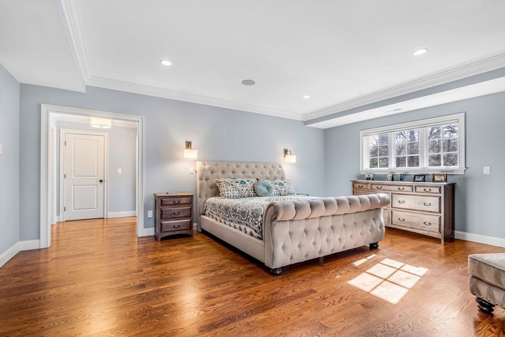 134 Pope Road Acton, MA 01720 - Photo 20 of 39 a bedroom with a bed and a large window