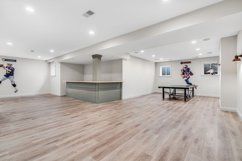 134 Pope Road Acton, MA 01720 - Photo 34 of 39 a view of kitchen and hall with wooden floor