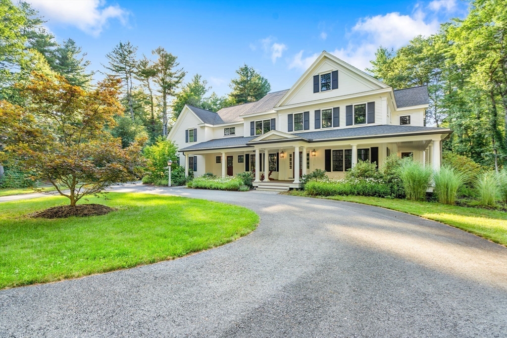 134 Pope Road Acton, MA 01720 - Photo 38 of 39 a front view of a house with a yard