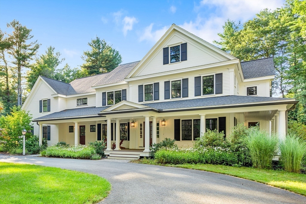 134 Pope Road Acton, MA 01720 - Photo 39 of 39 front view of a house next to a yard