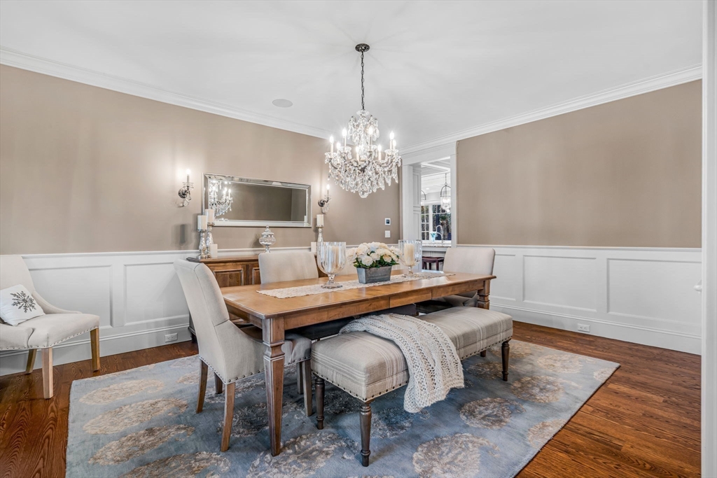 134 Pope Road Acton, MA 01720 - Photo 4 of 39 a view of a dining room with furniture and chandelier
