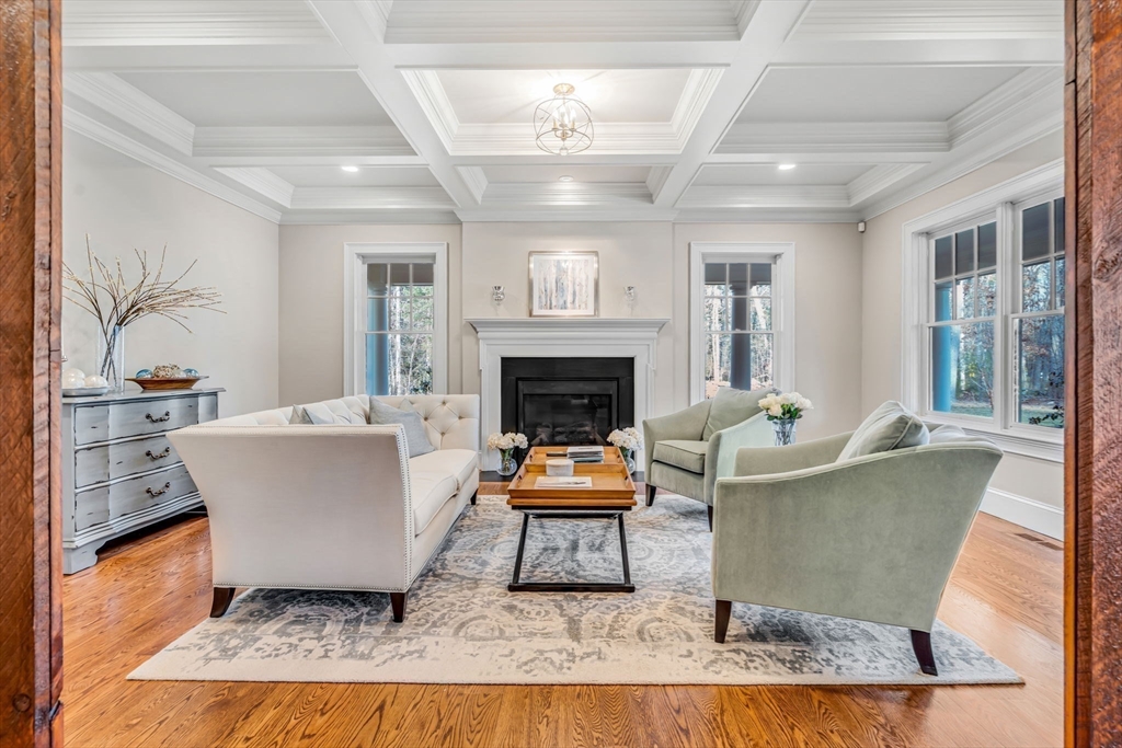 134 Pope Road Acton, MA 01720 - Photo 5 of 39 a living room with furniture and a fireplace