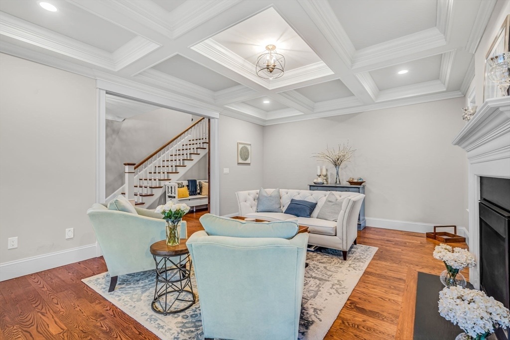 134 Pope Road Acton, MA 01720 - Photo 6 of 39 a living room with furniture and a fireplace