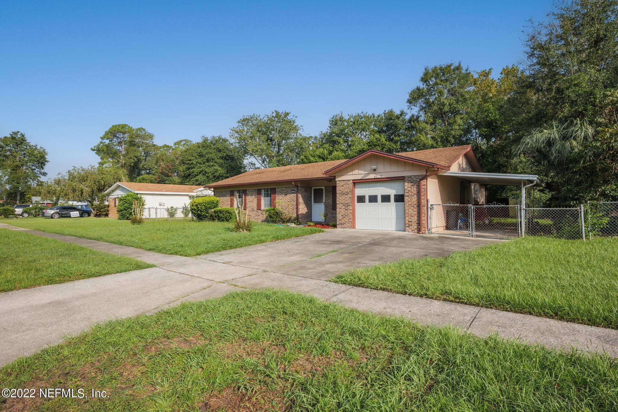 8209 Cassie Road Jacksonville, FL 32221 - Photo 2 of 24 Side view with 1 car garage