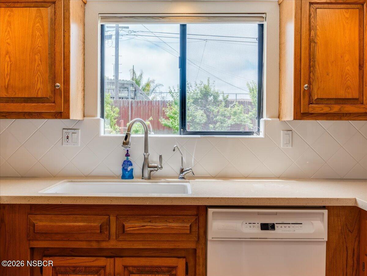 360 Tallyho Road Santa Maria, CA 93455 - Photo 20 of 72 a kitchen with a sink and a window
