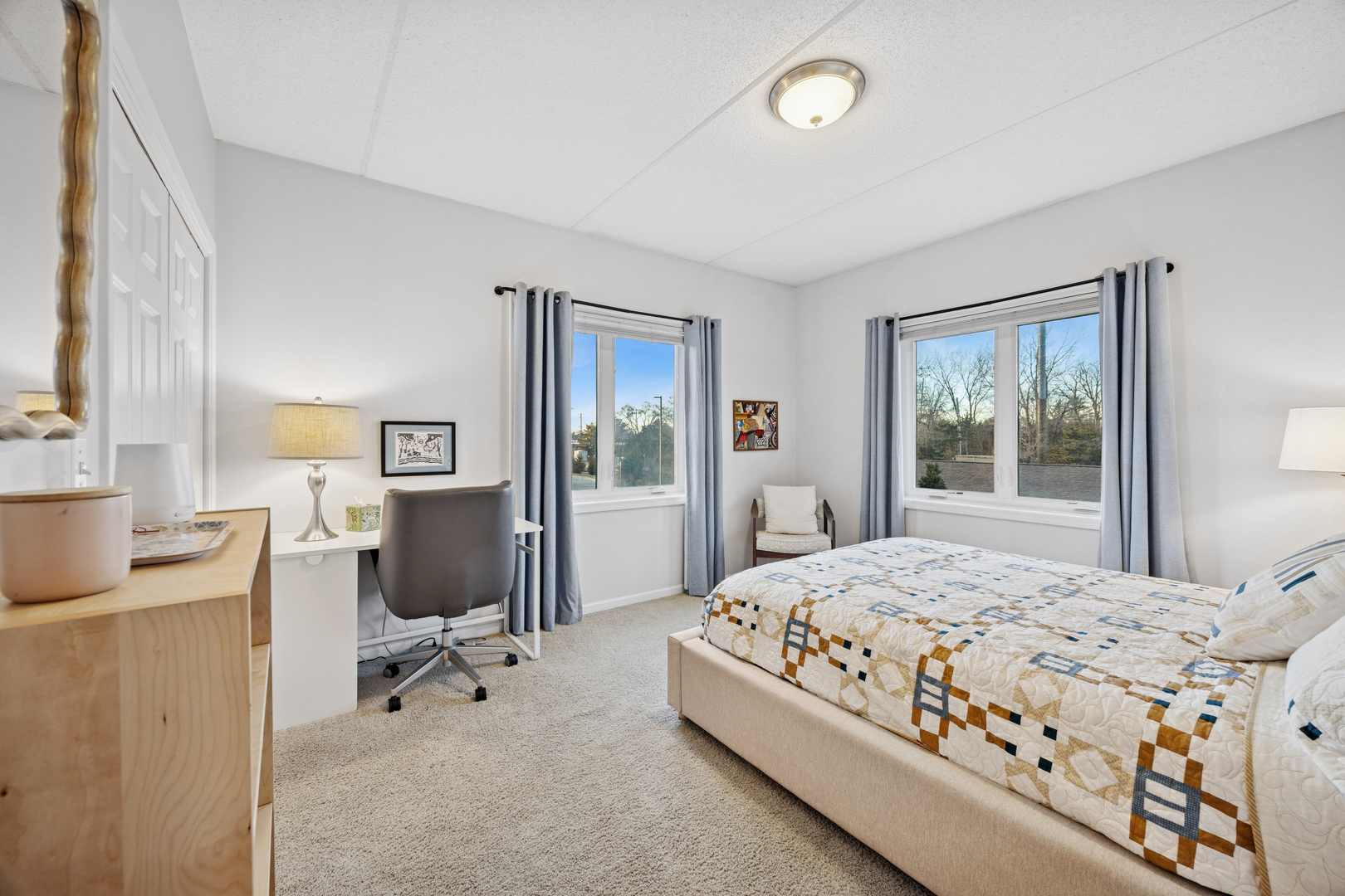 500 East St Charles Road, Unit 209 Lombard, IL 60148 - Photo 11 of 21 a bedroom with a bed and a desk