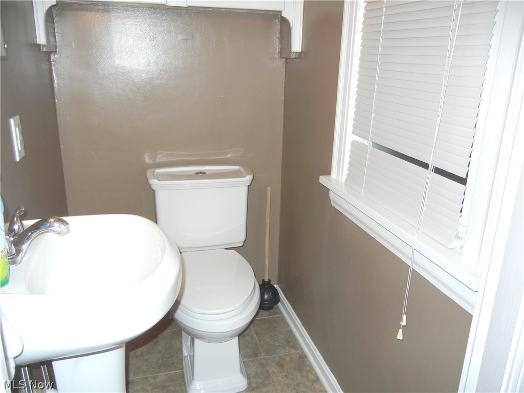 1105 Raff Road Southwest Canton, OH 44710 - Photo 7 of 15 Half bath on first floor