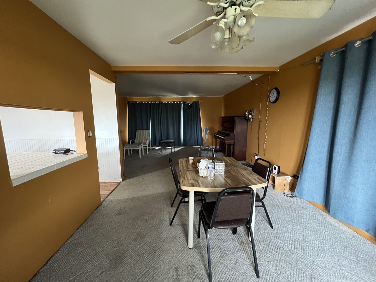 2957 East Kentucky Road Beecher, IL 60401 - Photo 5 of 22 a view of a dining room with furniture and a chandelier fan