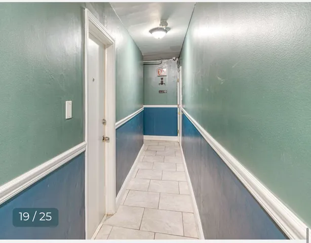 a bathroom with a shower and a toilet