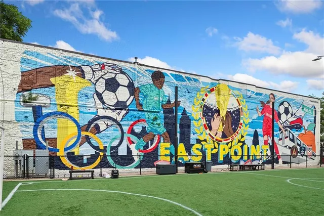 a view of street with sitting area