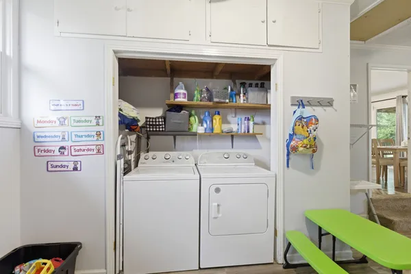 a utility room with dryer and washer