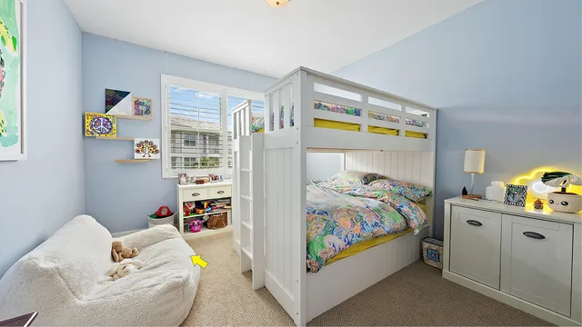 a bathroom with a shower sink and mirror