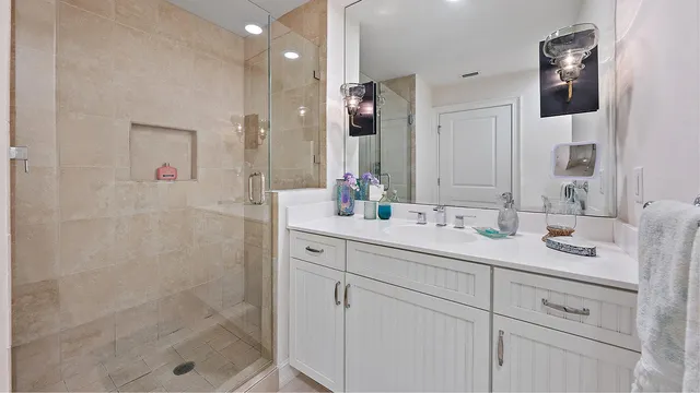 a spacious bedroom with a bed and a window