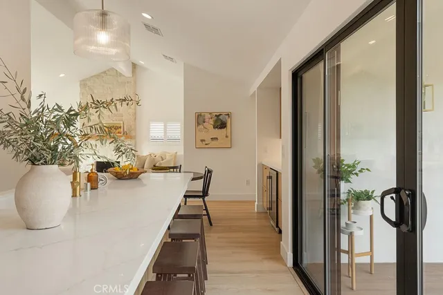 a view of a living room and dining room