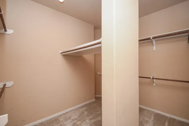 a view of livingroom with furniture and ceiling fan