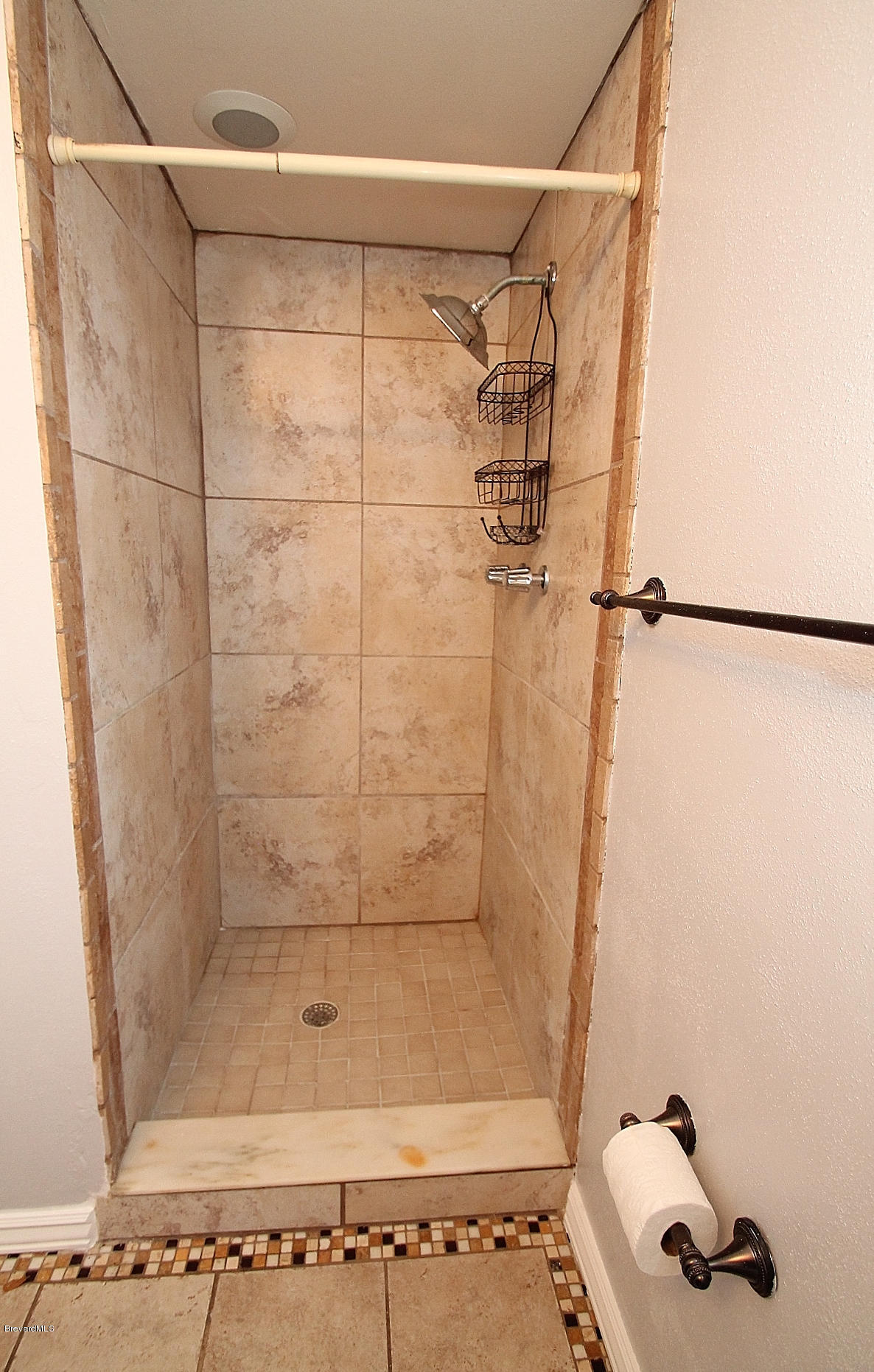 238 Capron Road Port St. John, FL 32927 - Photo 12 of 23 a bathroom with a shower