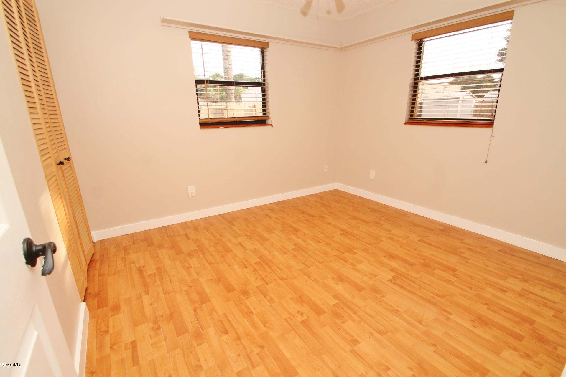 238 Capron Road Port St. John, FL 32927 - Photo 14 of 23 an empty room with windows