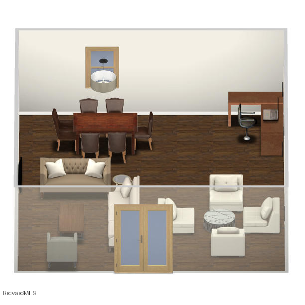 238 Capron Road Port St. John, FL 32927 - Photo 23 of 23 a living room with furniture and a table
