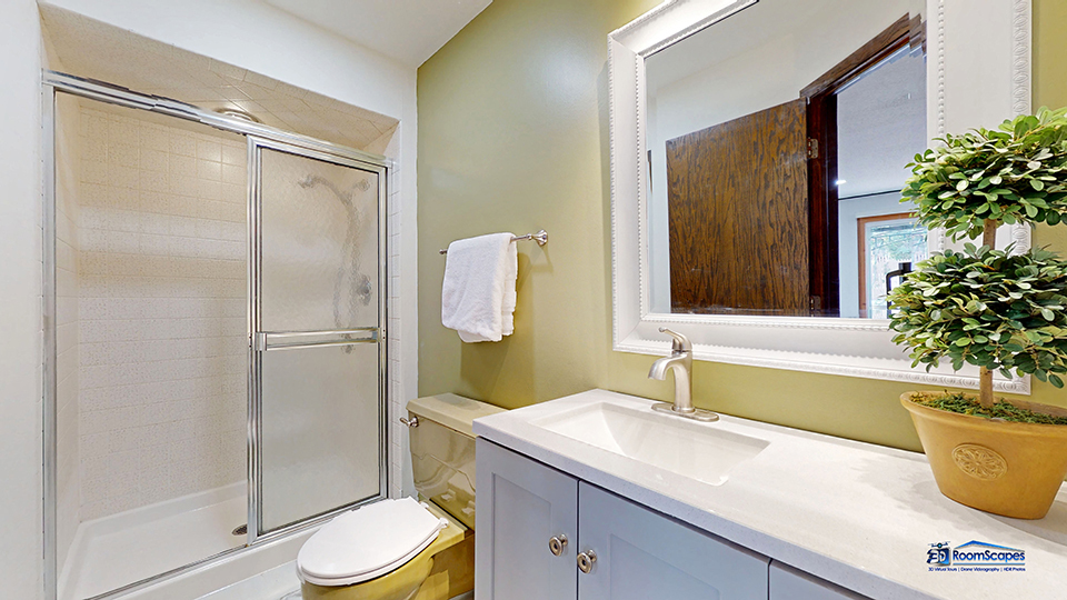26605 West Wilmot Road Antioch, IL 60002 - Photo 11 of 30 a bathroom with a granite countertop sink toilet and shower