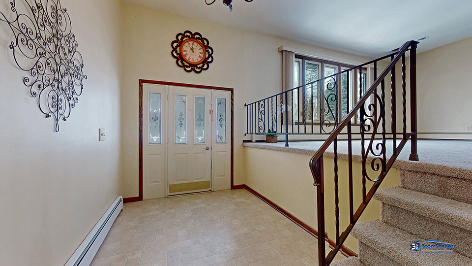 26605 West Wilmot Road Antioch, IL 60002 - Photo 3 of 30 a view of a hallway with stairs